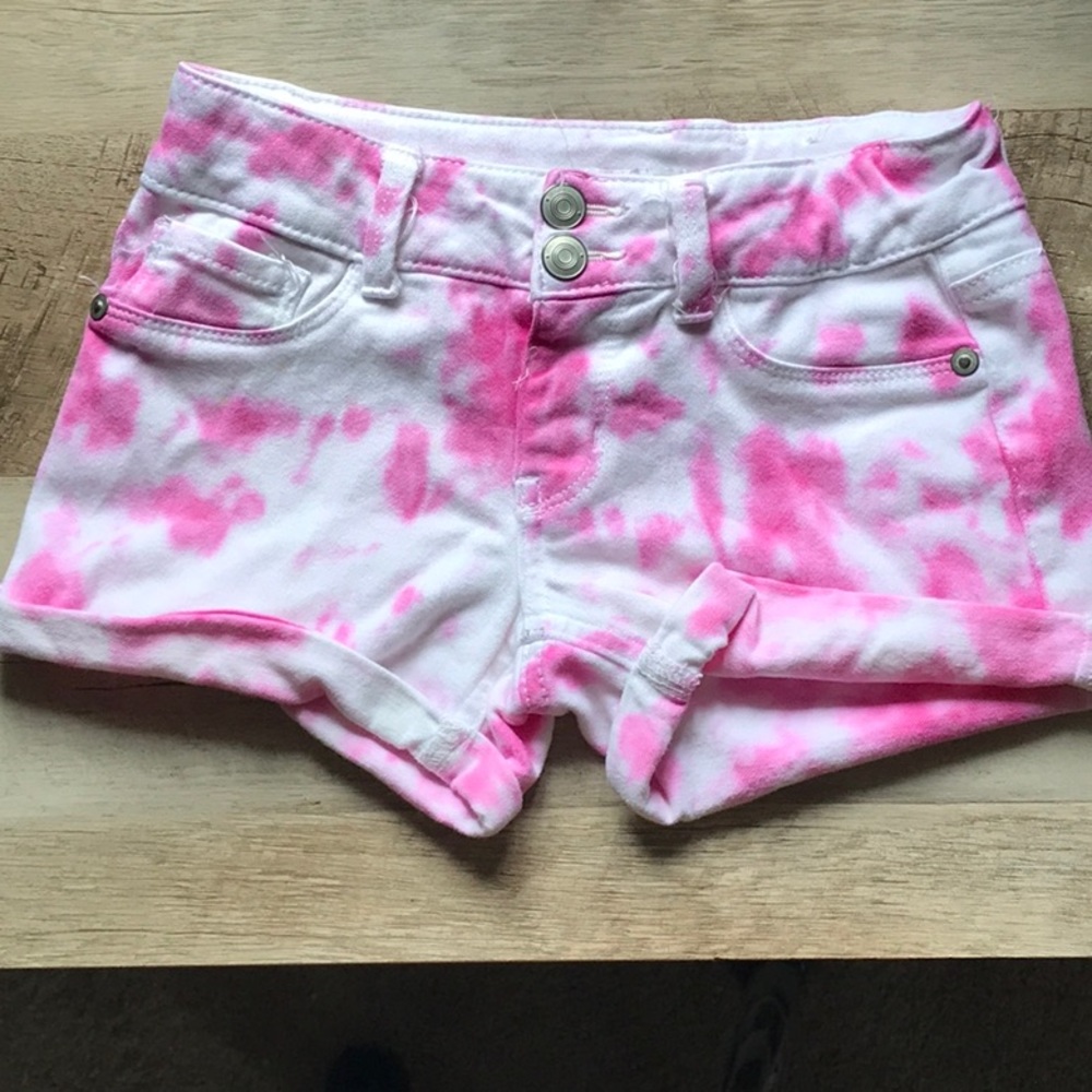 Girls pink tie dye shorts.